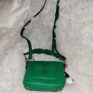 Inc, by Macy's.  This is a cute green vegan crossbody bag.